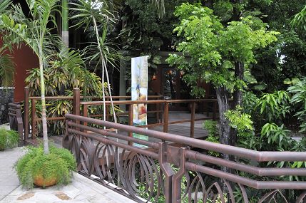 the garden walkway area at the karibe hotel